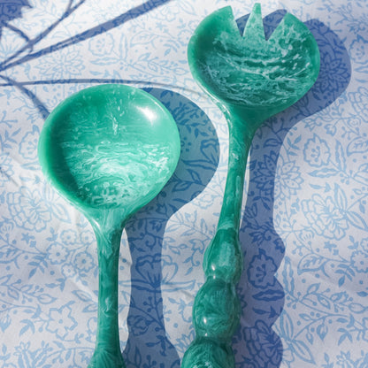 Pair of green beaded salad servers with marbled details 